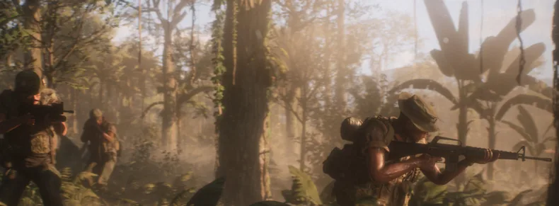 Infantry push through thick jungle undergrowth