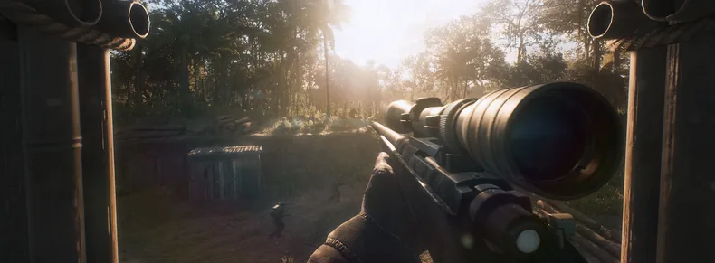 Squad marksman scanning a jungle treeline