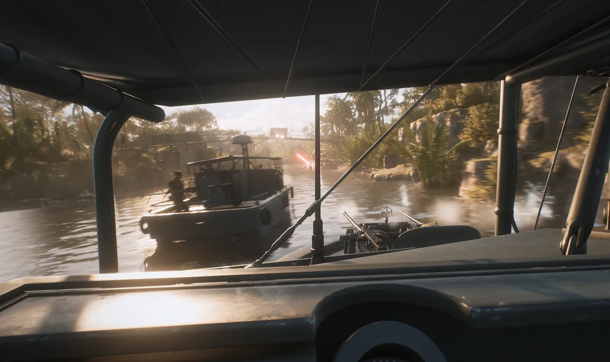 River patrol boat cutting through a jungle waterway